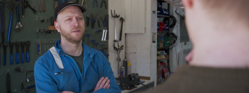 Workman speaking to a customer. This features on our business feedback page.
