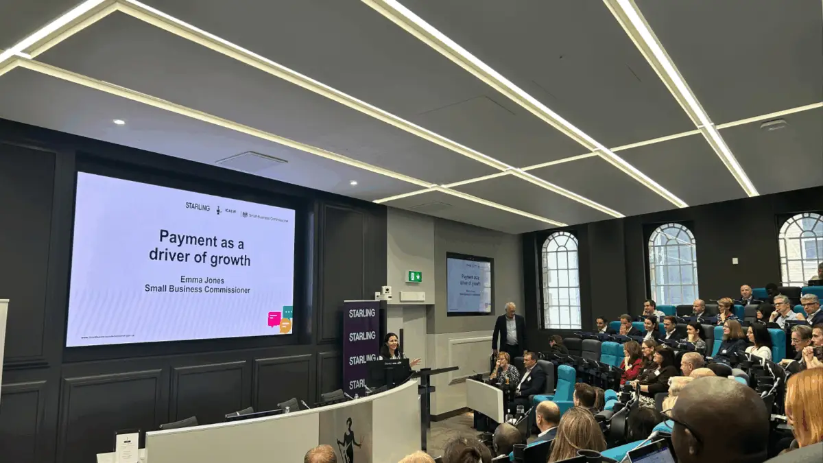 Image of the Commissioner presenting at the Free the Founder event